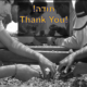 "Thank you" on background of volunteers sifting