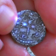 Silver half-shekel coin with tripe-pomegranate cluster motive